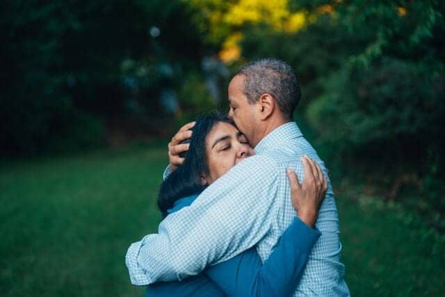 son hugging mother, forging your parents